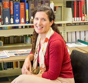 Photo of Anne Hall in the research library